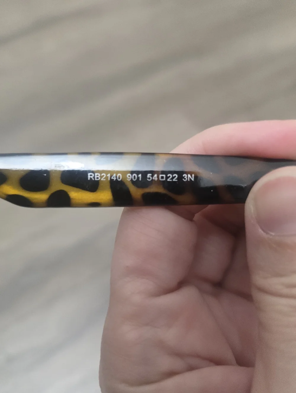 Ray-Ban RB2140 Original Wayfarer Classic, featuring a distinct Havana tortoise